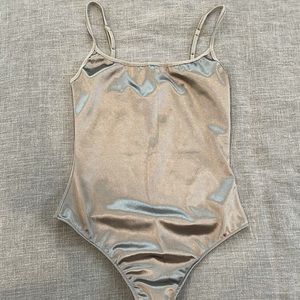 FreePeople brand new silver satin thong body suit